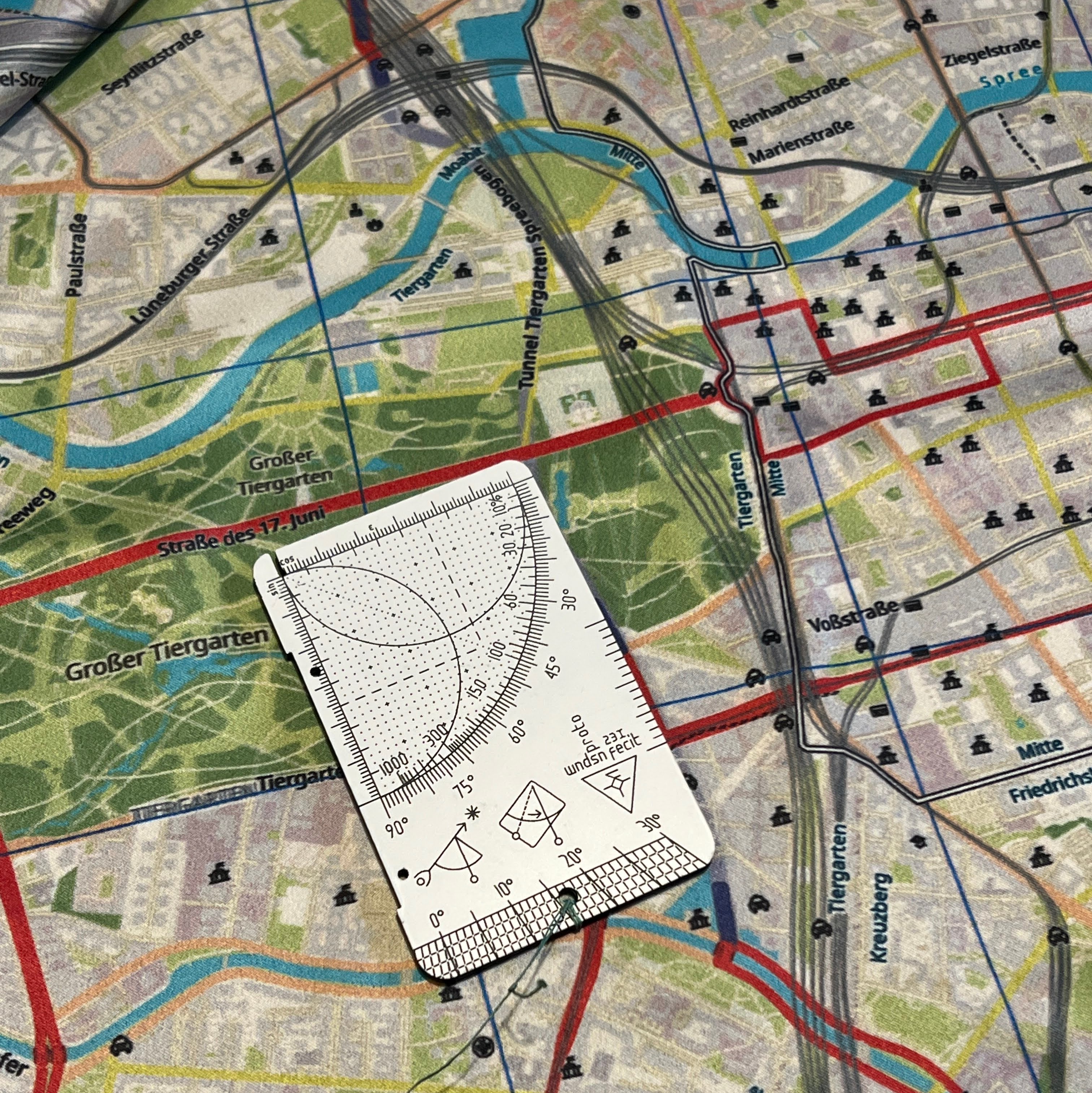 Using the inch scale of a Wndsn Telemeter to determine a distance on the map.
